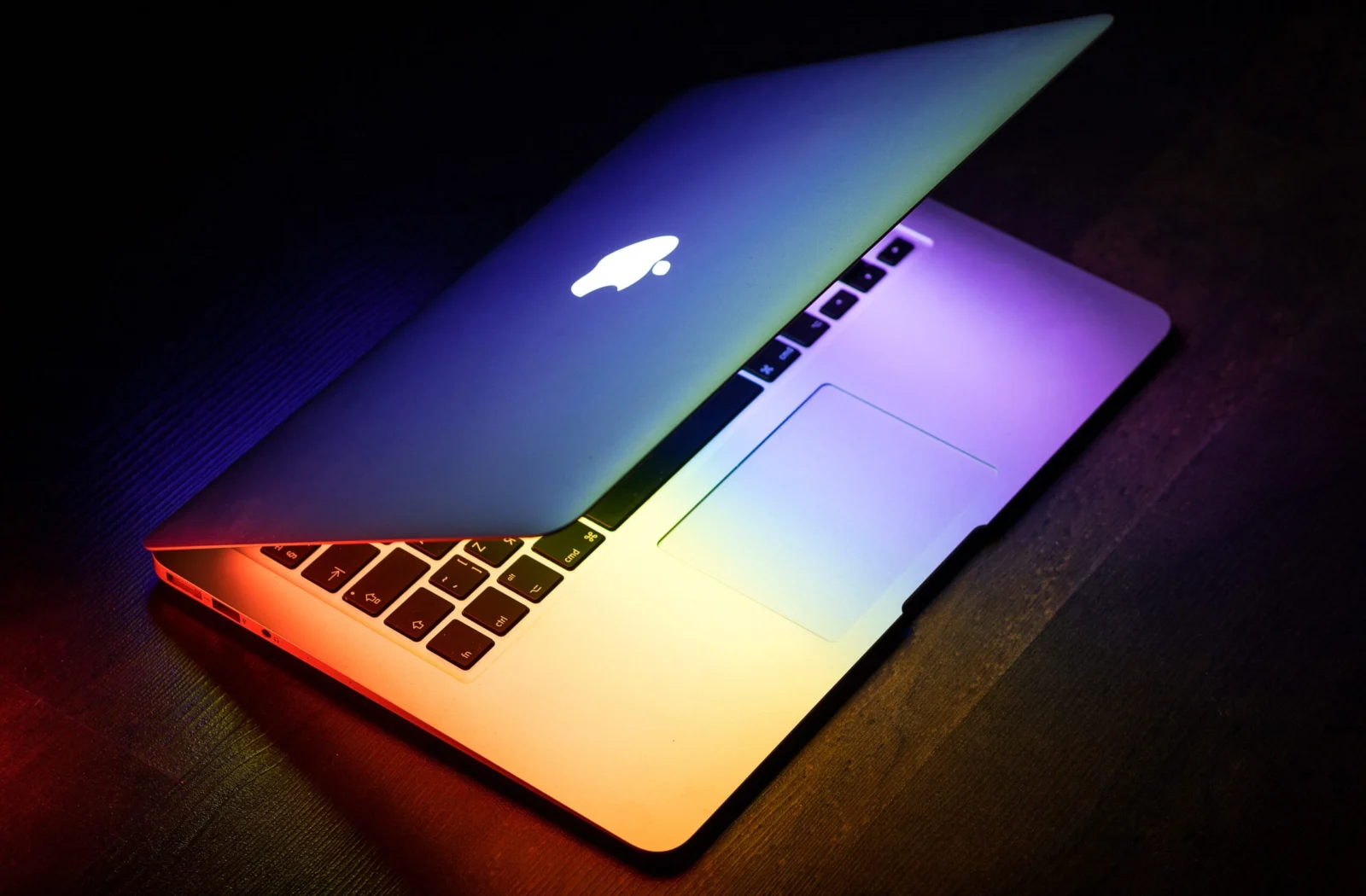Silver MacBook Air Early 2015 with its lid partly open